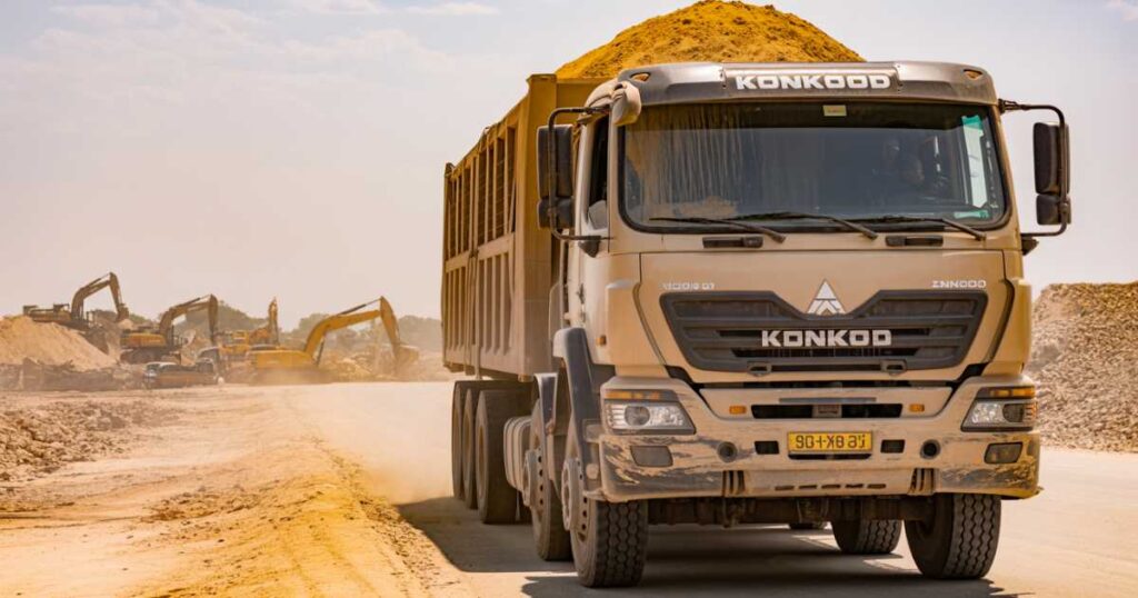Truck delivering Lwera sand from Kampala for construction, highlighting sand for concrete in Uganda.